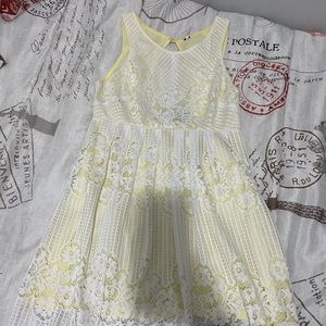 Yellow and white lace dress